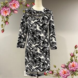 Scoop neck long sleeve floral knee length dress